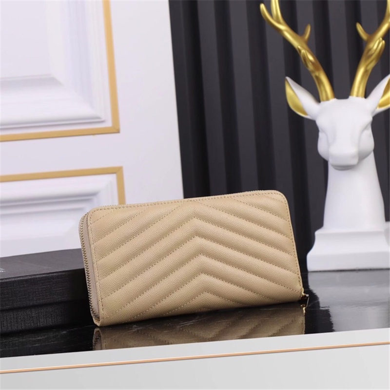 CASSANDRE MATELASSÉ ZIP AROUND WALLET IN GRAIN DE POUDRE EMBOSSED LEATHER Beige High