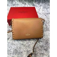 SMALL ROCKSTUD GRAINY CALFSKIN CROSSBODY BAG Camel High